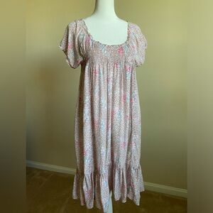 Free People spring baby-doll style mini dress.  Floral, short sleeved.  Medium
